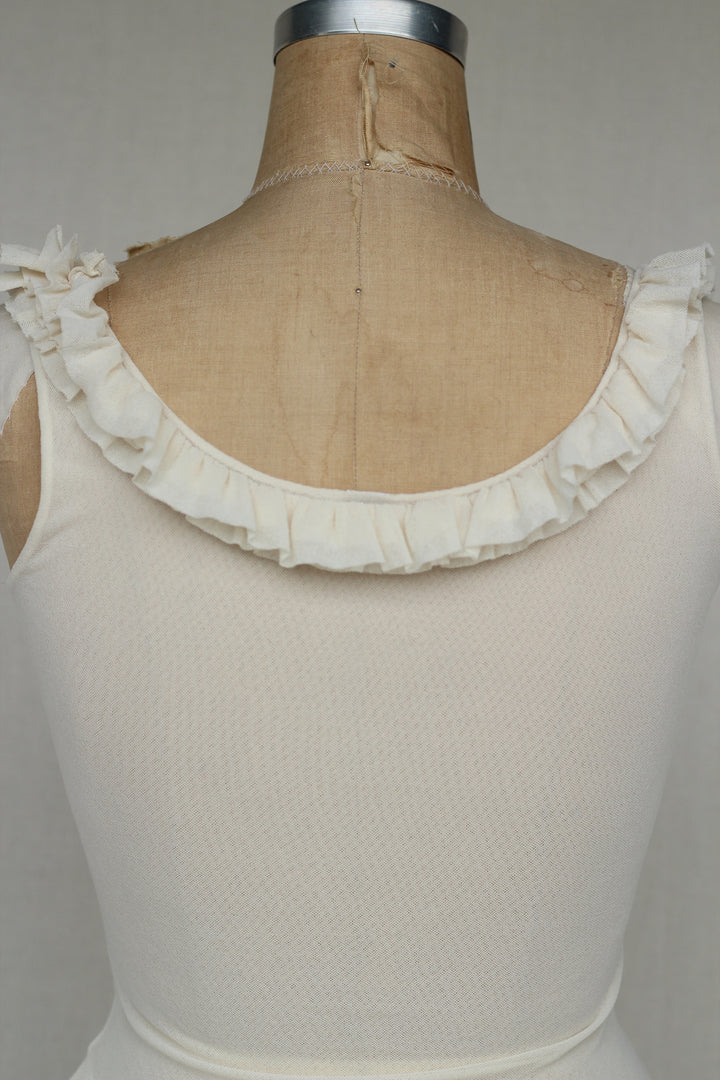 Sweat Pea Ivory Ruffle Ivory Sleeveless Top